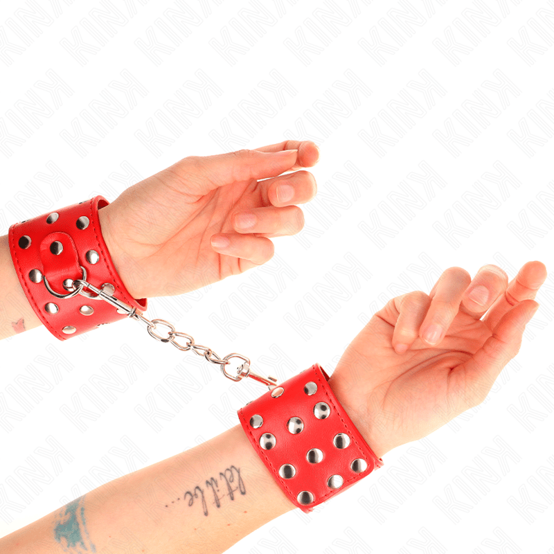 Kink Handgelenkfesseln mit Nietenbesatz – Druckverschluss, 19–24 cm