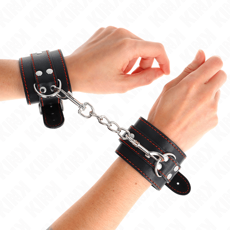 Kink – Handgelenkfesseln Schwarz mit rotem Futter