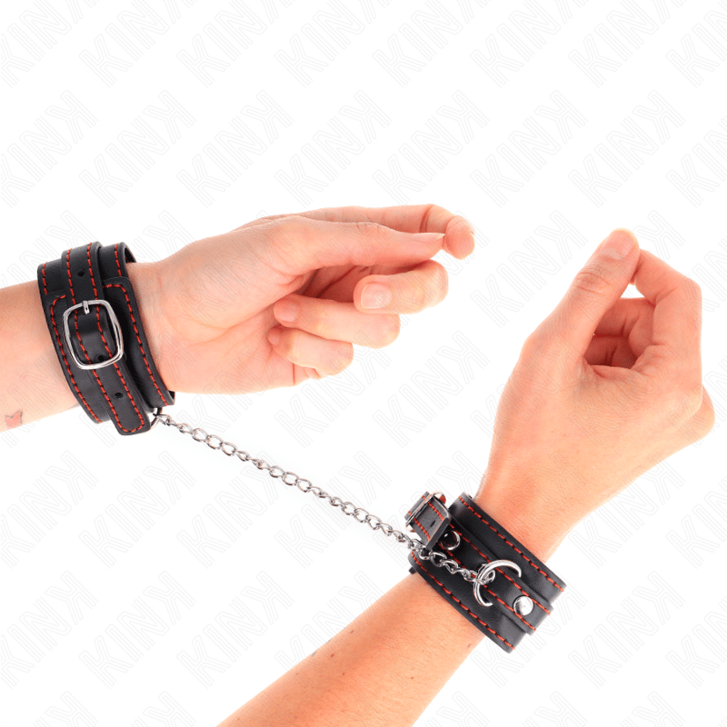 Kink – Kleine Handgelenkfesseln in Schwarz mit rotem Futter