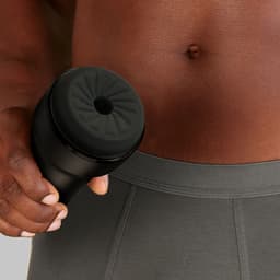 Produktverpackung des Kiiroo Pocket-Masturbator Feel in der Farbe Schwarz