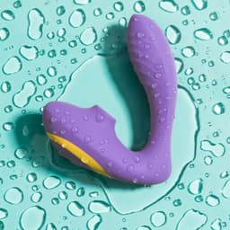 ROMP Reverb G-Punkt-Vibrator in Lila, Seitenansicht mit bauchigem Kopf und flexiblem Hals