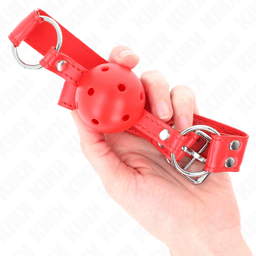 Kink Ballknebel mit hohler Hartkugel in Rot flach ausgelegt, gesamte Riemenlänge sichtbar