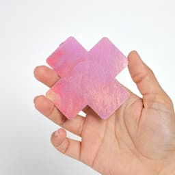 Klebeseite der Secret Play X-Pasties mit Schutzfolie in der Nahaufnahme