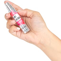 Secretplay Orchid Pheromon-Parfum, Sprühkopf und Flakon im Detail von der Seite
