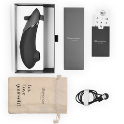 Womanizer Next Klitorisstimulator mit 3D Pleasure Air in Schwarz, mit magnetischem USB-Ladekabel an den Ladekontakten