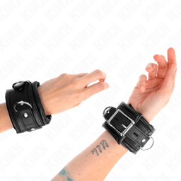 Kink Handgelenkfesseln in Schwarz, Gesamtansicht des Paars, Handgelenkfesseln der Kink BDSM-Serie im Karton