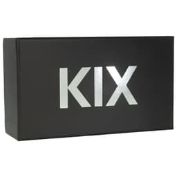 ElectraStim Kix Elektrostimulator von der Seite auf dunklem Untergrund