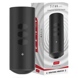 Kiiroo Titan Masturbator mit Ladekabel am Anschluss des Gehäuses