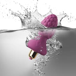 RO-80-Bullet des Rocks-Off Ass-Berries Analplugs neben dem Silikonkörper