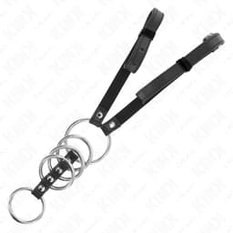 Kink Penisring-Set flach ausgelegt, komplette Gurtlänge von 112 cm sichtbar