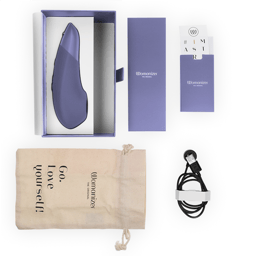 Womanizer Enhance Klitorisstimulator mit Pleasure Air, mit magnetischem USB-Ladekabel an den Ladekontakten