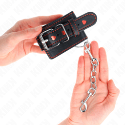 Verpackung der Kink Handgelenkfesseln in Schwarz, Handgelenkfesseln der Kink BDSM-Serie im Karton