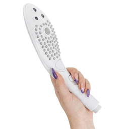 Womanizer Wave im Badezimmer-Setting aus nächster Nähe fotografiert